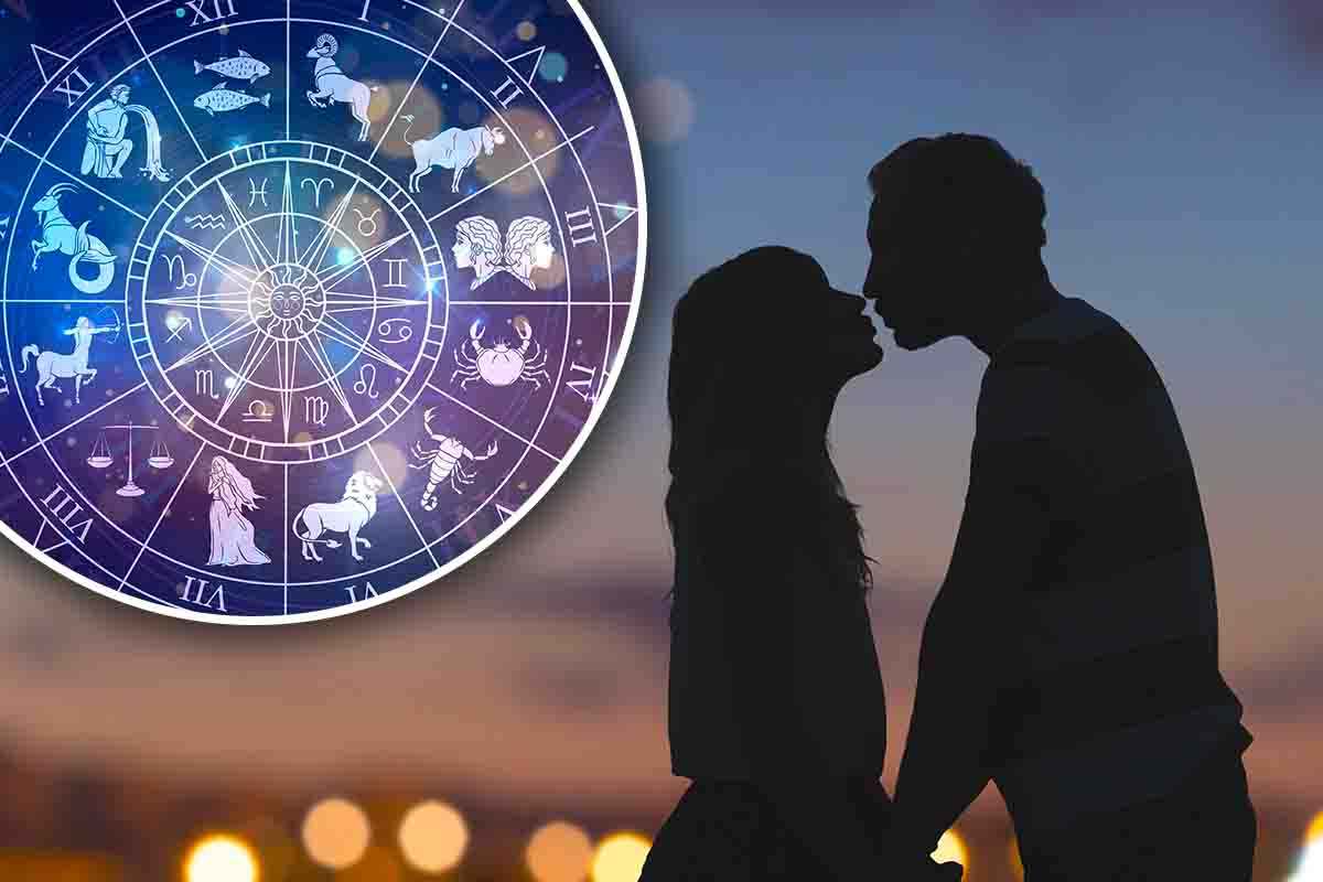 coppia che si bacia e ruota dello zodiaco