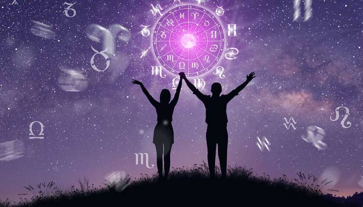 coppia felice e ruota dei segni zodiacali