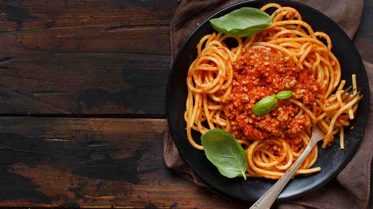 spaghetti con sugo al polpo